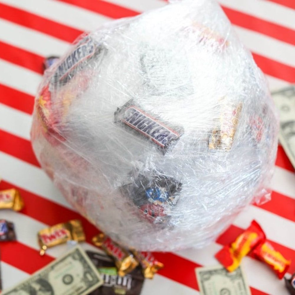 Christmas Saran wrap ball game
